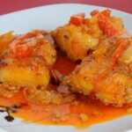 Bacalao encebollado con pimientos y tomate estilo canario