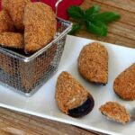 Mejillones tigre rellenos, rebozados y fritos en su concha