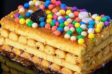 Turrón Doña Pepa con miel y grageas de colores receta peruana