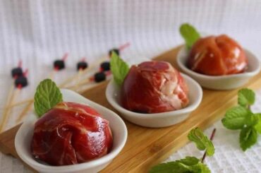 Bombones de jamón serrano rellenos de queso, almendras y dátiles aperitivo español