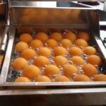Buñuelos de yuca nicaragüenses con miel de rapadura receta casera