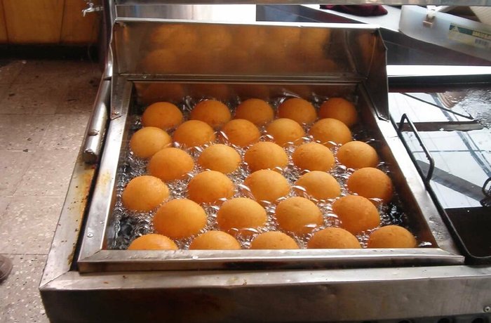 Buñuelos de yuca nicaragüenses con miel de rapadura receta casera