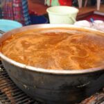 Pepián guatemalteco de pollo en recado con güisquil papa y ejote receta tradicional