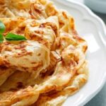 Roti canai pan plano en capas receta de Malasia
