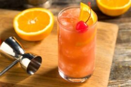 Cóctel sex on the beach en vaso alto con naranja receta casera